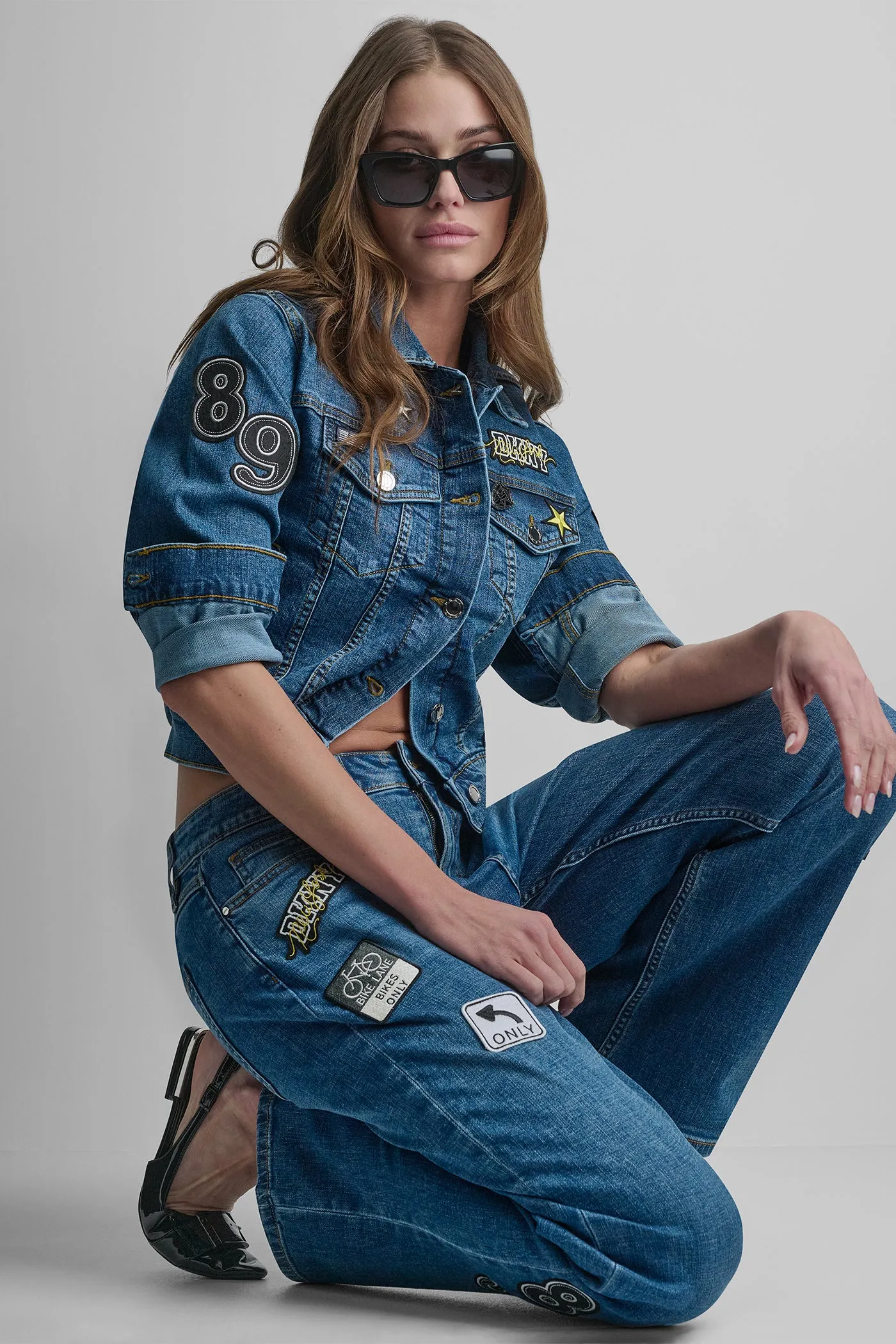 DENIM PINS & PATCHES TRUCKER JACKET sold by DKNY