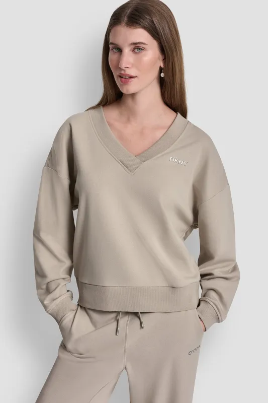 METALLIC BUBBLE LOGO V-NECK PULLOVER made by DKNY