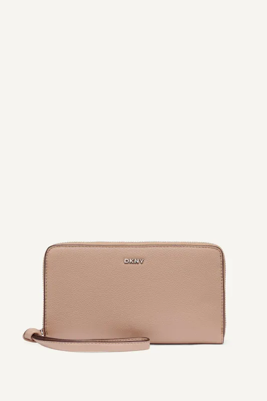 PAULA LARGE ZIP AROUND WALLET sold by DKNY