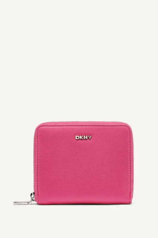 PAULA SMALL ZIP AROUND WALLET sold by DKNY