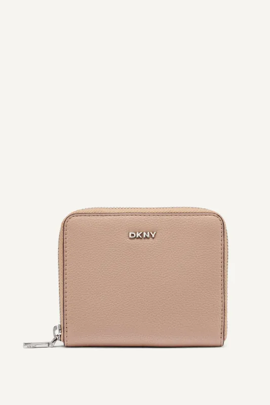 PAULA SMALL ZIP AROUND WALLET sold by DKNY