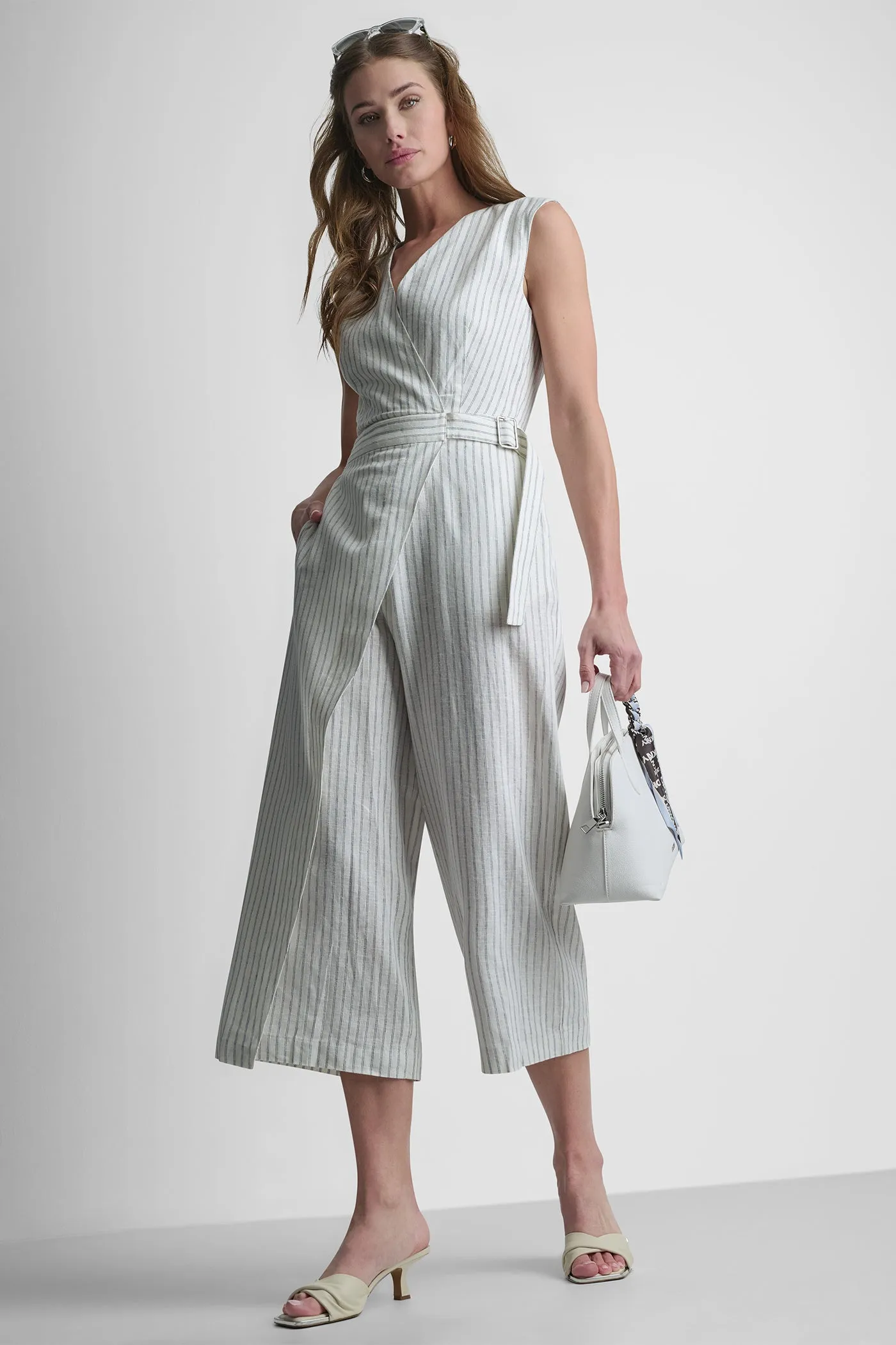 LINEN-BLEND SLEEVELESS WRAP-EFFECT V-NECK STRIPED JUMPSUIT sold by DKNY