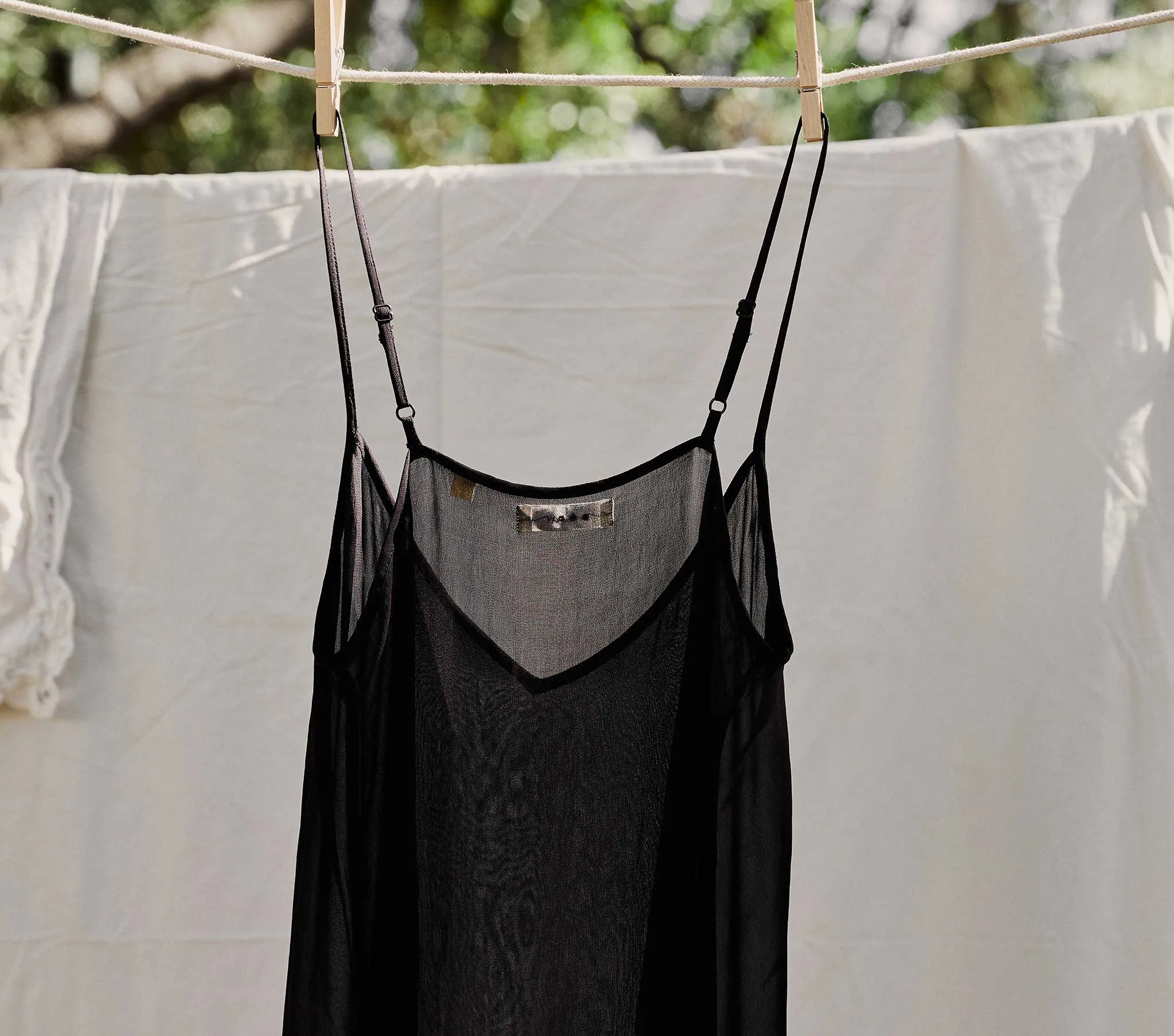 SHORT DEEP V-NECK SLIP -- BLACK sold by Doen product image thumbnail 4