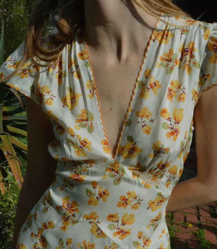 DIANNE DRESS -- AMBER FROLICKING FLORAL sold by Doen
