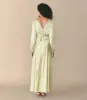 FIORA DRESS -- PISTACHIO GREEN sold by Doen