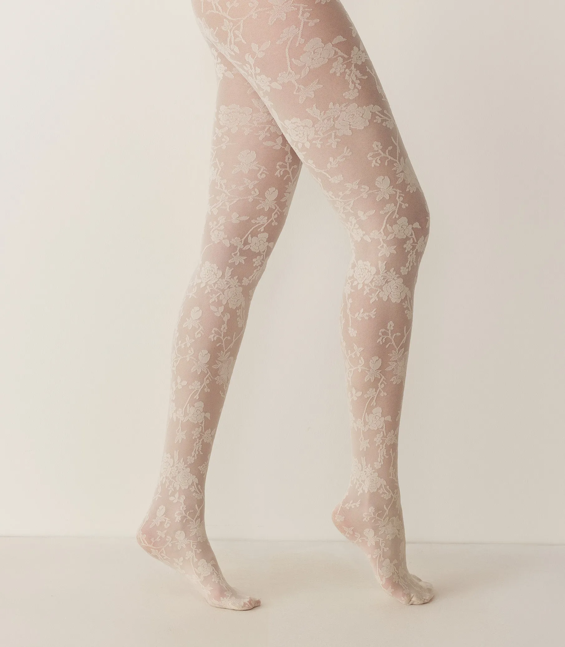 WOLFORD FLORAL LACE TIGHTS -- BUTTERMILK sold by Doen