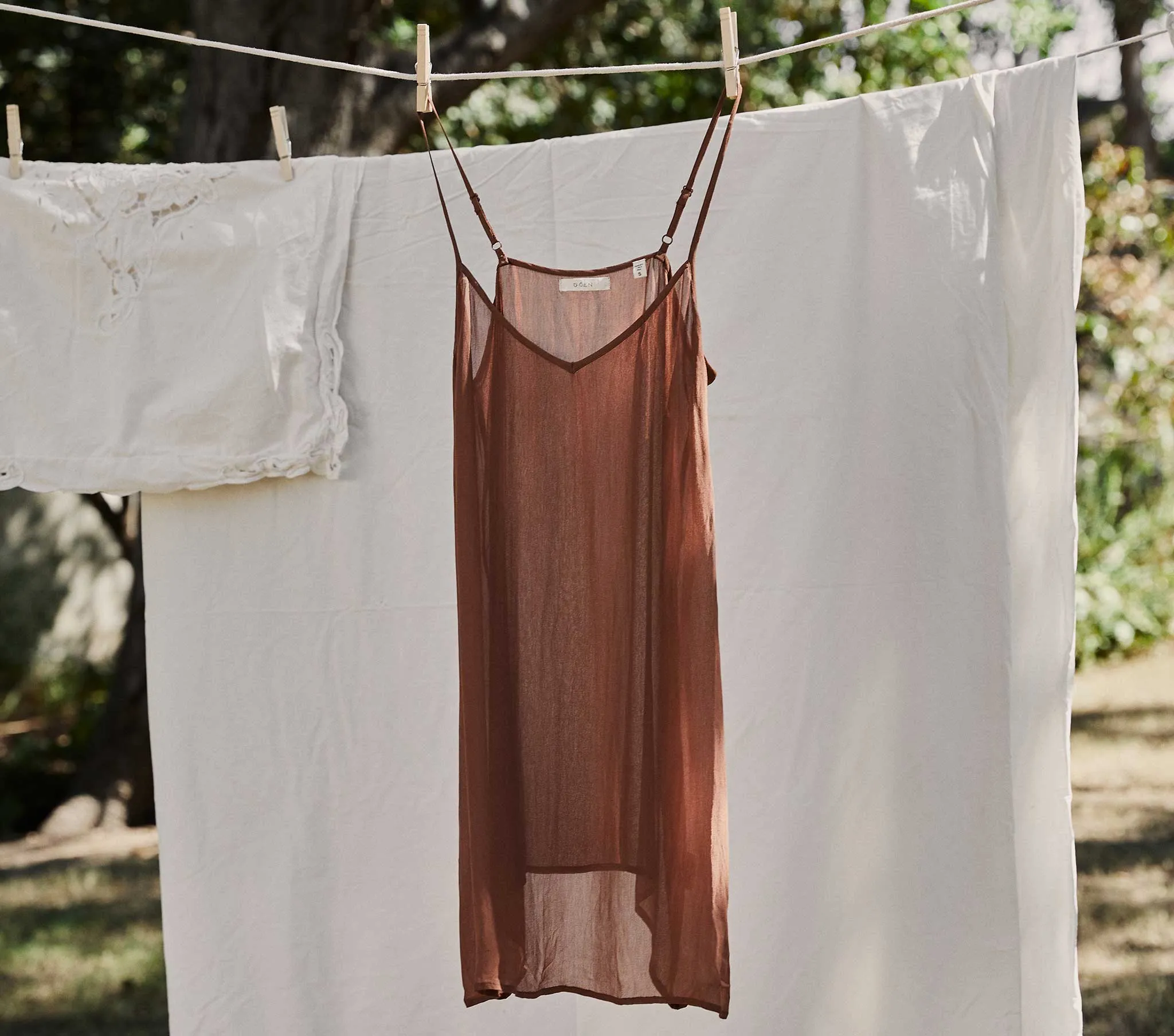 SHORT DEEP V-NECK SLIP -- CAROB sold by Doen