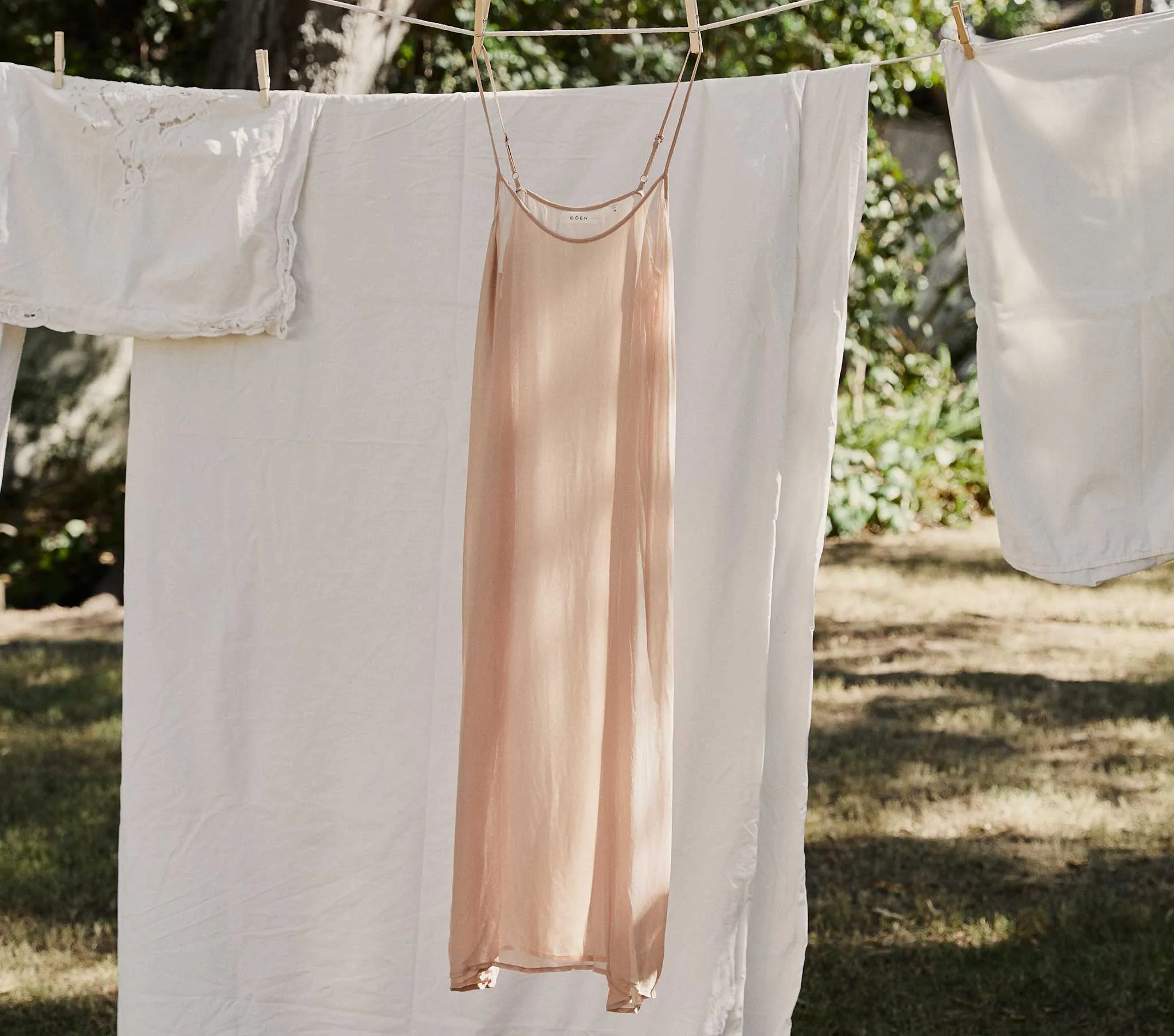 LONG SCOOP NECK SLIP -- CONCH sold by Doen