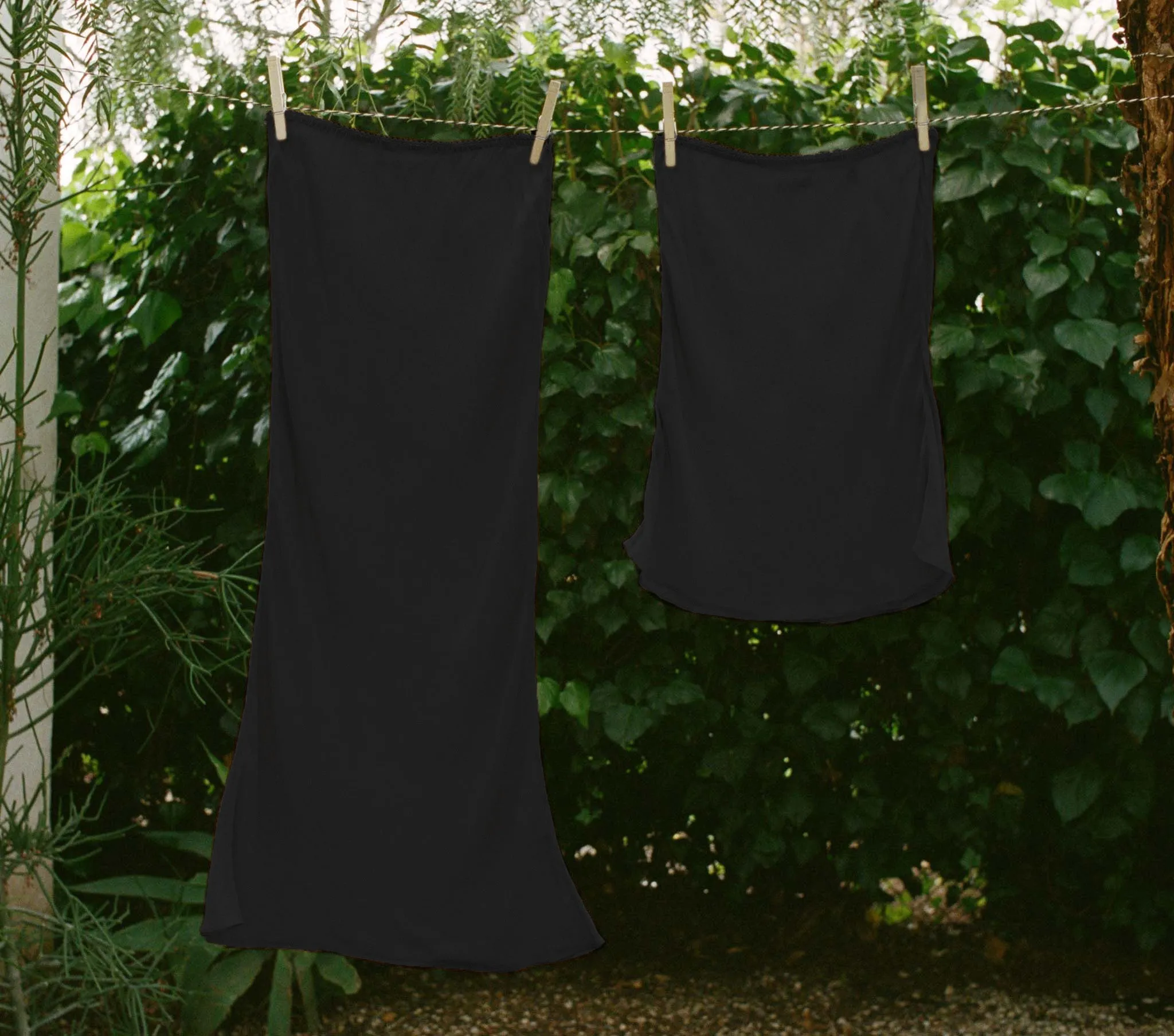 HMD -- MINI SKIRT SLIP -- BLACK sold by Doen