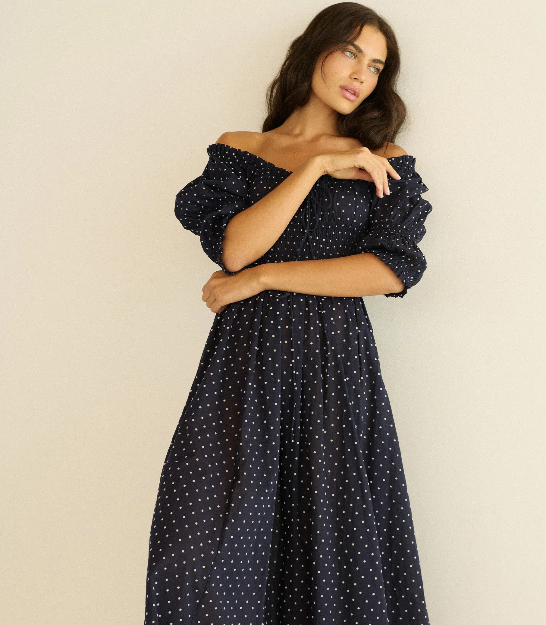 ISCHIA DRESS -- NAVY FLOCK DOT sold by Doen