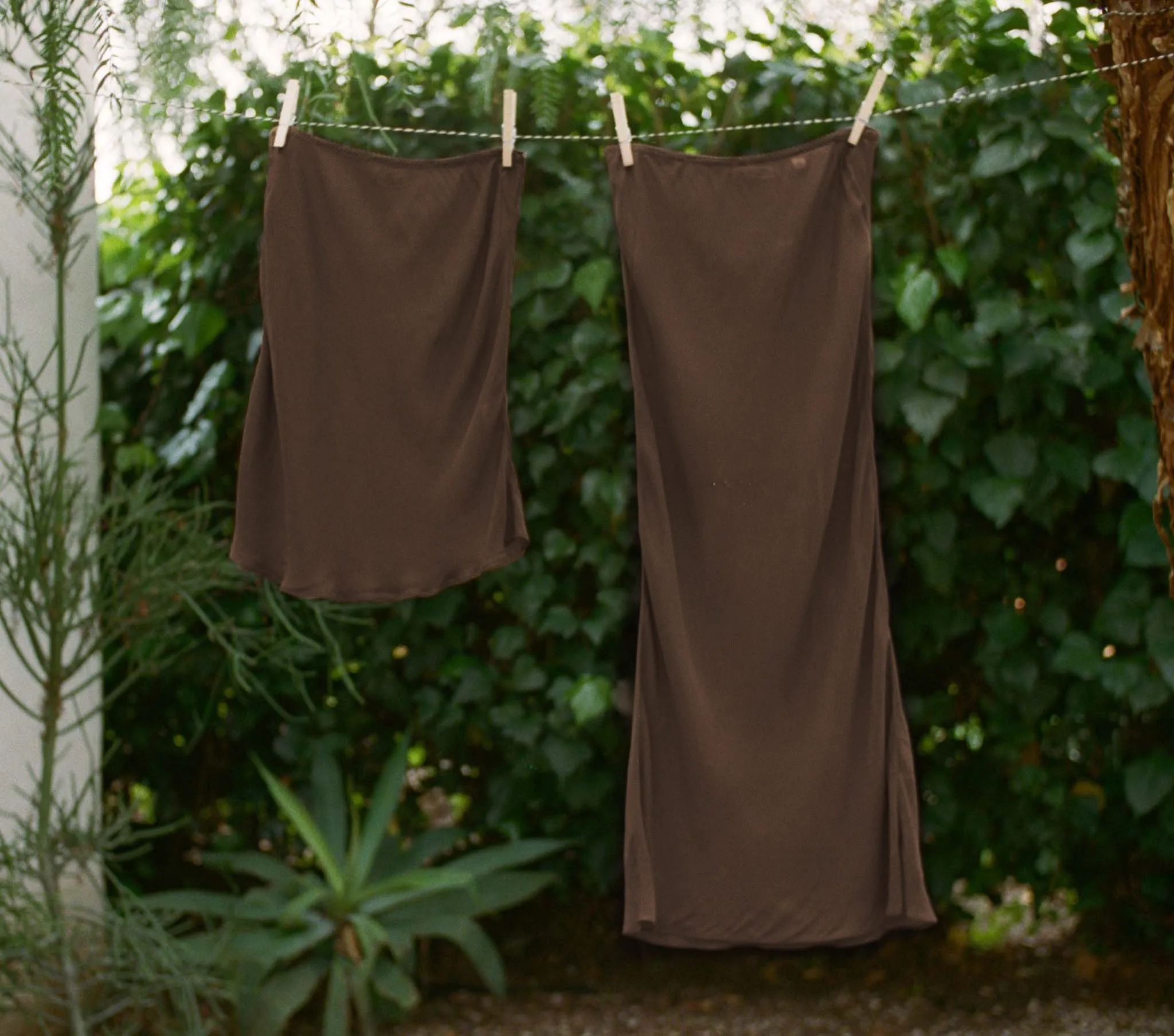 LONG SKIRT SLIP -- UMBER sold by Doen
