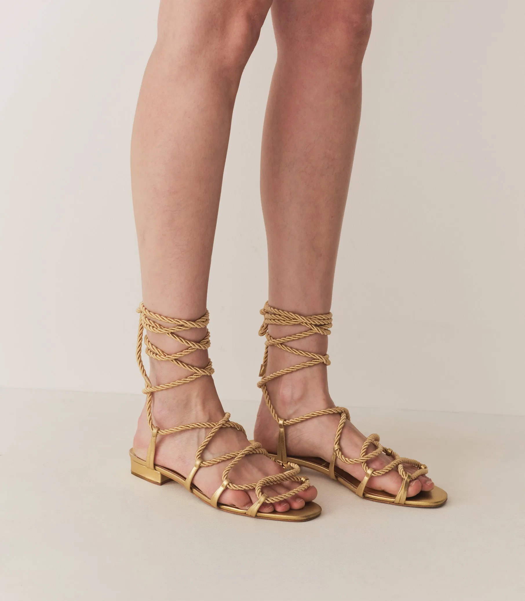 CASTILLE GLADIATOR SANDAL -- GOLD METALLIC sold by Doen