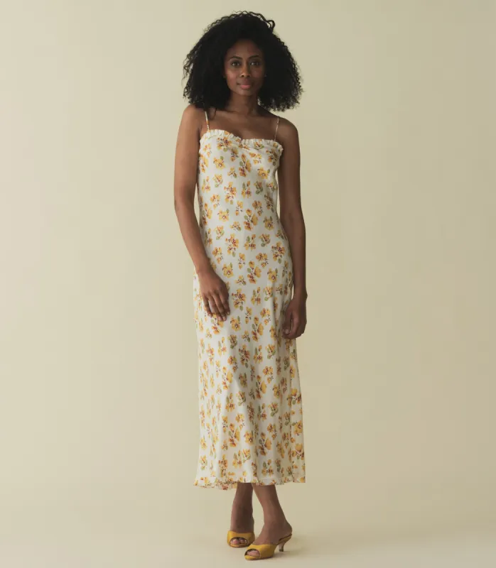 CALSI DRESS -- AMBER FROLICKING FLORAL sold by Doen