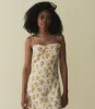CALSI DRESS -- AMBER FROLICKING FLORAL sold by Doen