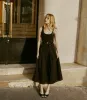 SEBASTIANE SKIRT -- BLACK sold by Doen