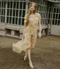 NEVARA DRESS -- CITRON ANEMONE BLOOM sold by Doen