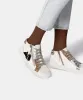 ZONYA SNEAKERS IN WHITE/BLACK EMBOSSED LIZARD - re:vita sold by Dolce Vita