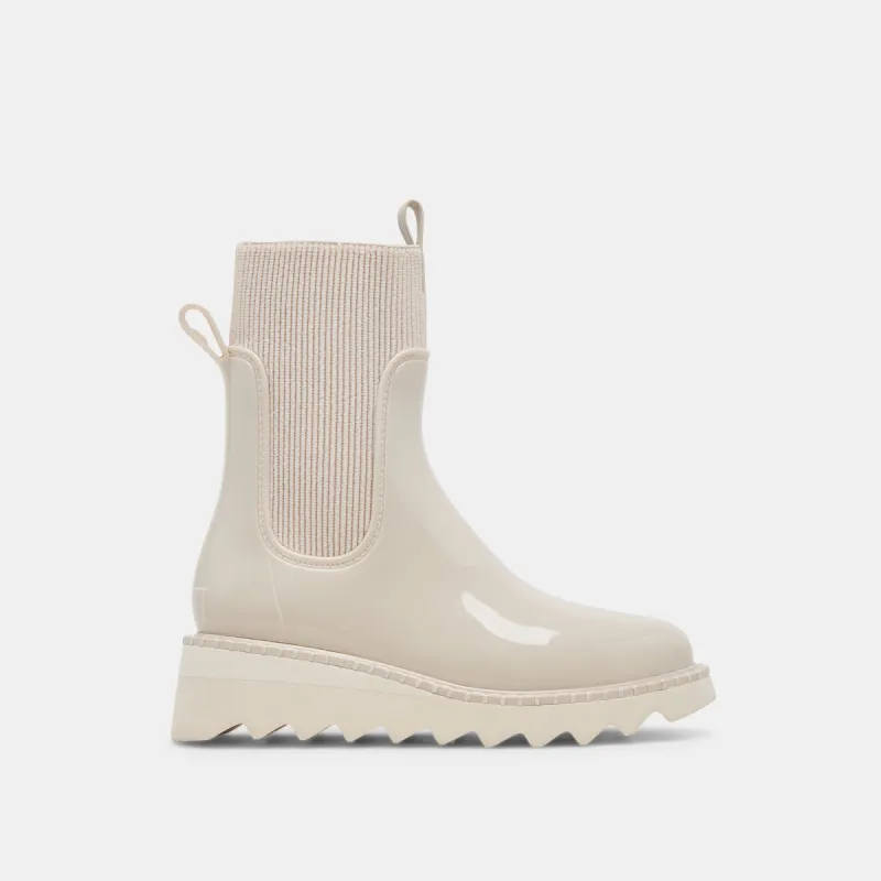 TROPIC H2O BOOTS IVORY PATENT STELLA sold by Dolce Vita