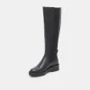 EAMON H2O WIDE CALF BOOTS BLACK LEATHER sold by Dolce Vita