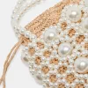 ADELINE HANDBAG NATURAL PEARL RAFFIA sold by Dolce Vita