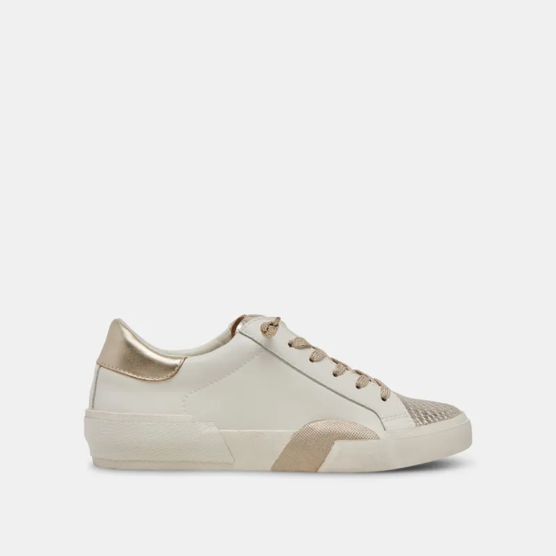 ZINA SNEAKERS WHITE GOLD LEATHER sold by Dolce Vita