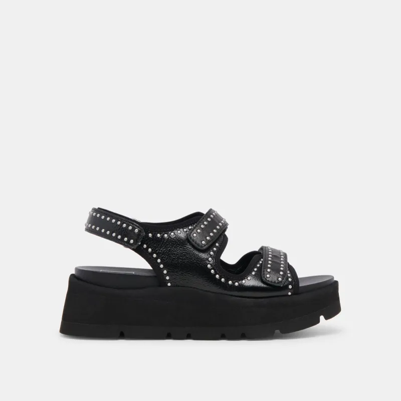 DUBAI STUD SANDALS MIDNIGHT CRINKLE PATENT sold by Dolce Vita