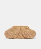 CRISSY CLUTCH NATURAL PEARL RAFFIA sold by Dolce Vita