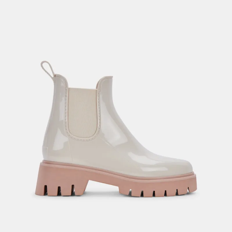 THUNDR H2O BOOTS IVORY PATENT STELLA sold by Dolce Vita