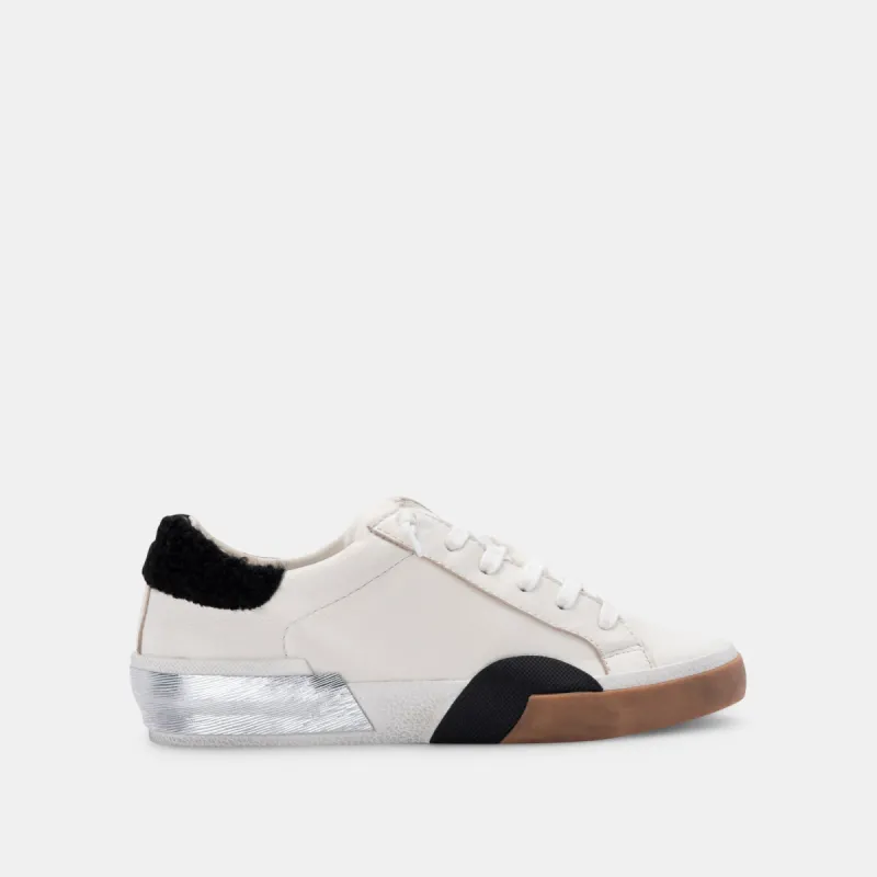ZINA PLUSH SNEAKERS WHITE BLACK LEATHER sold by Dolce Vita