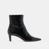 SONDRA BOOTIES NOIR EMBOSSED LEATHER sold by Dolce Vita
