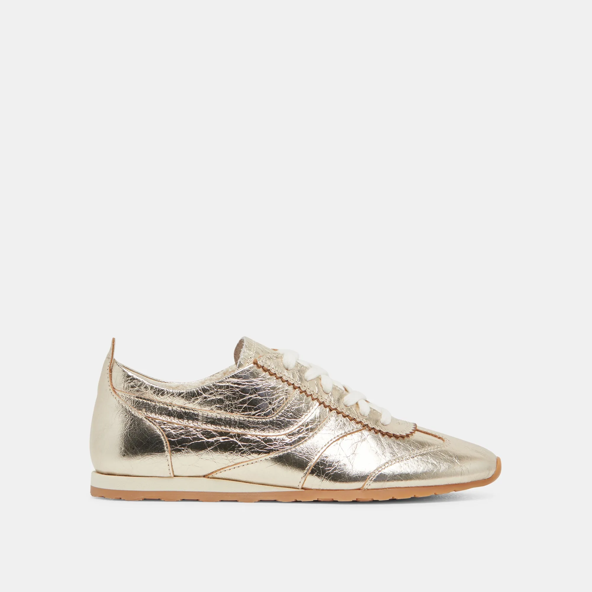 DELANY SNEAKERS LIGHT GOLD CRINKLE PATENT sold by Dolce Vita