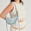 VERONA SHOULDER BAG BLUE SUEDE sold by Dolce Vita