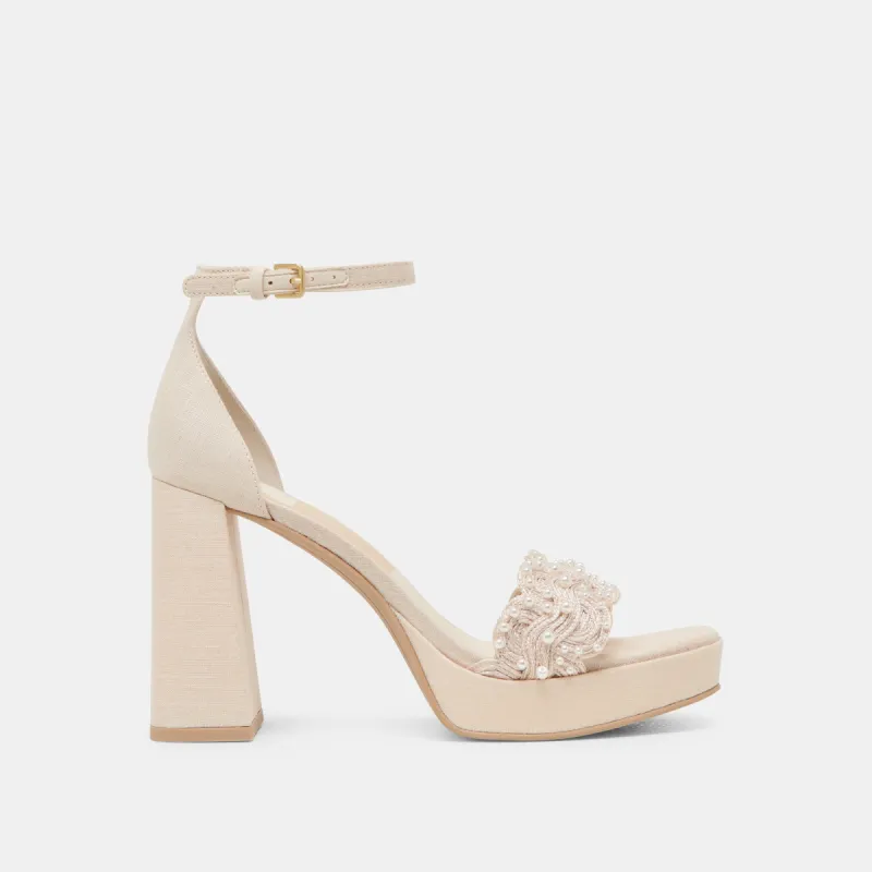 PELTIN PEARL HEELS VANILLA WOVEN RAFFIA sold by Dolce Vita