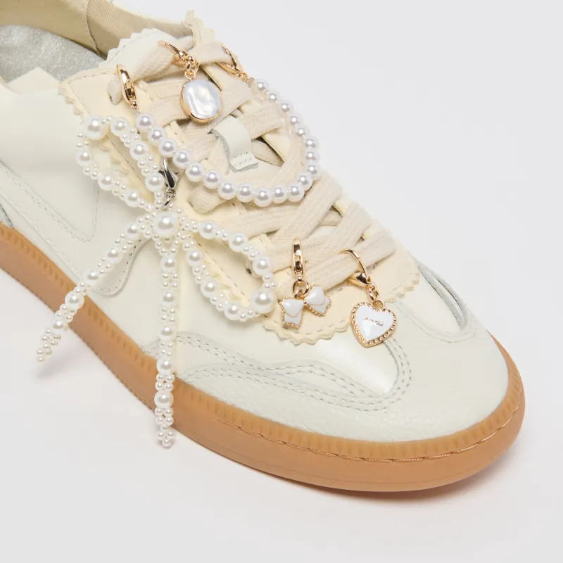 NOTICE SNEAKERS WHITE + PEARL CHARM BUNDLE sold by Dolce Vita
