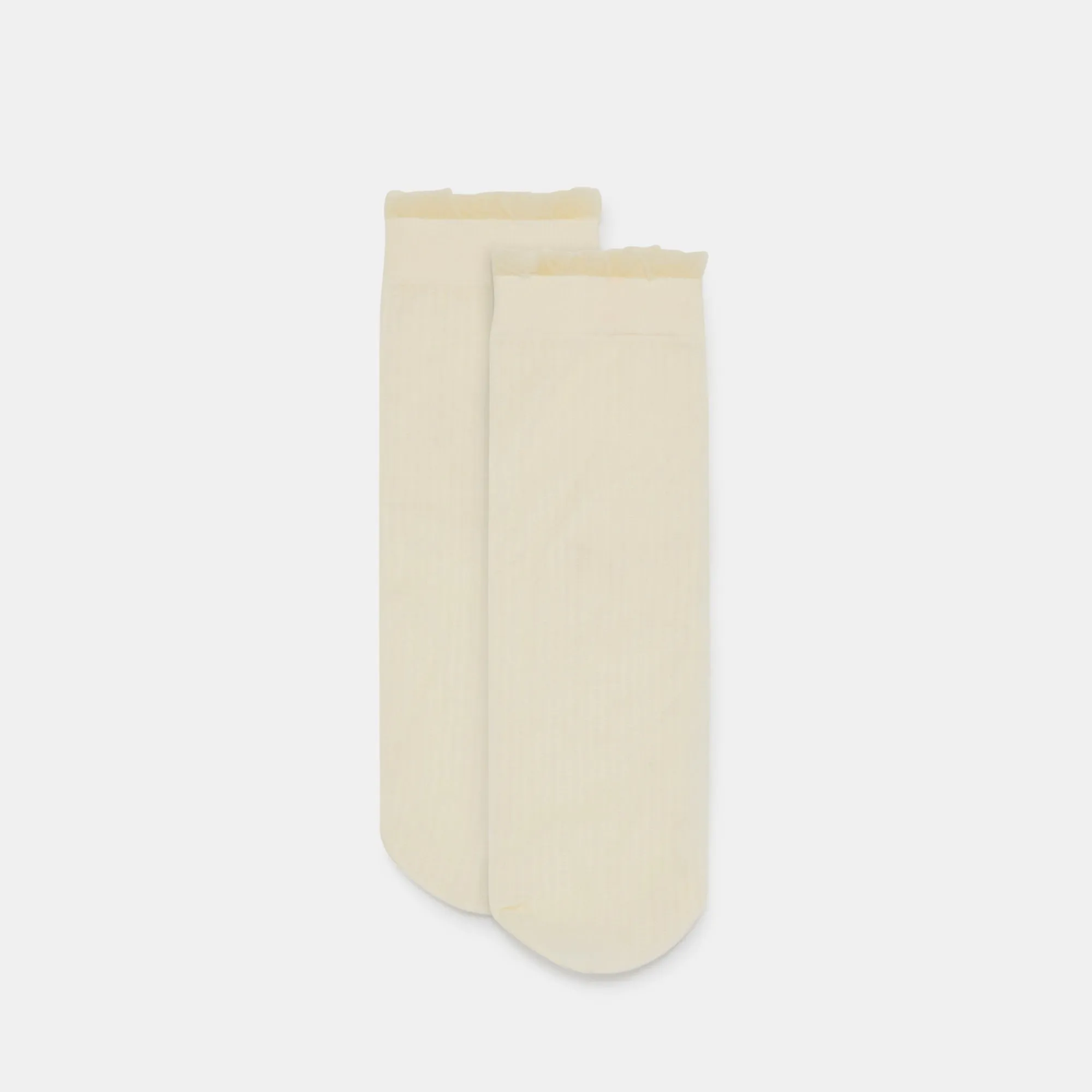 SHEER RUFFLE SOCKS IVORY sold by Dolce Vita