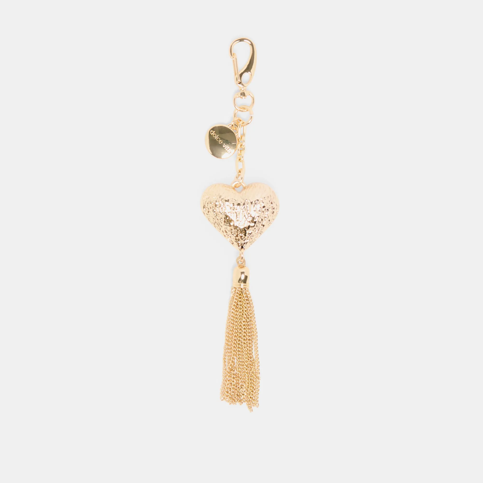 HEART TASSEL BAG CHARM GOLD sold by Dolce Vita