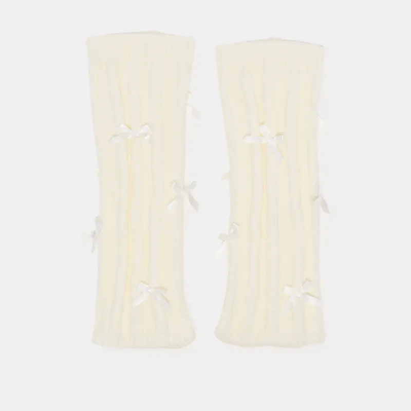 SATIN BOW LEG WARMERS IVORY sold by Dolce Vita