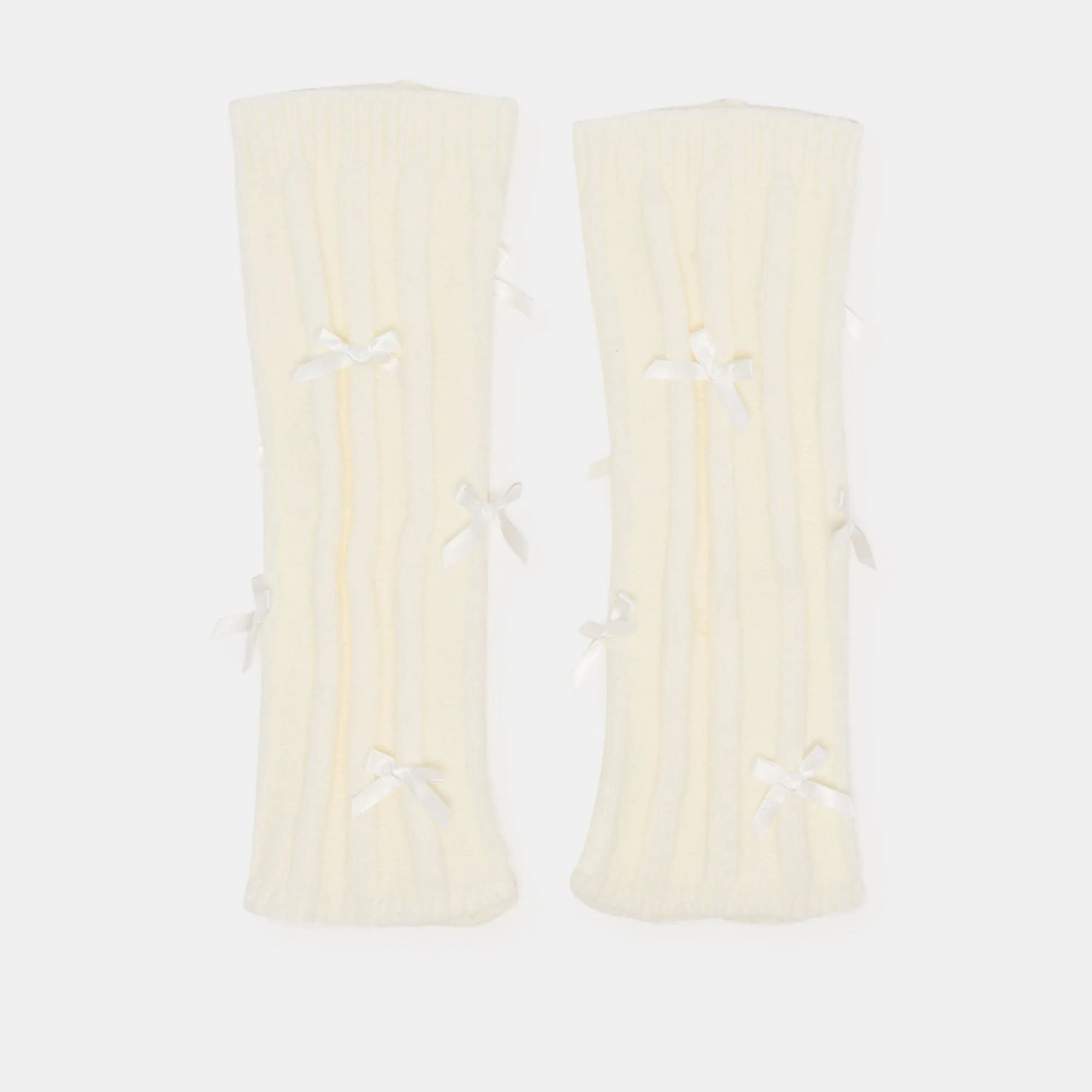 SATIN BOW LEG WARMERS IVORY sold by Dolce Vita