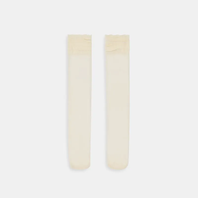 RUFFLE SHEER KNEE HIGH SOCKS IVORY sold by Dolce Vita
