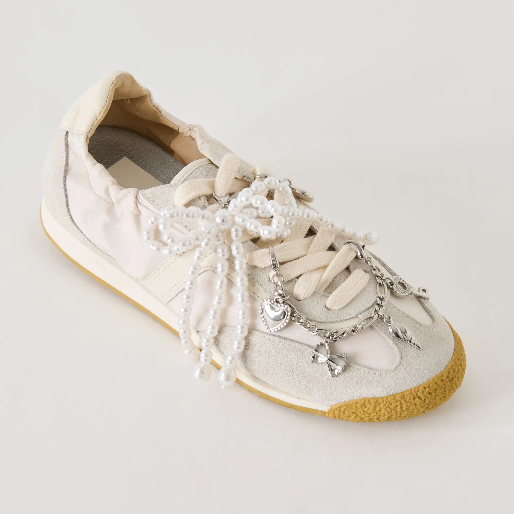 SARIYA SNEAKERS WHITE NYLON + SILVER CHARM BUNDLE sold by Dolce Vita