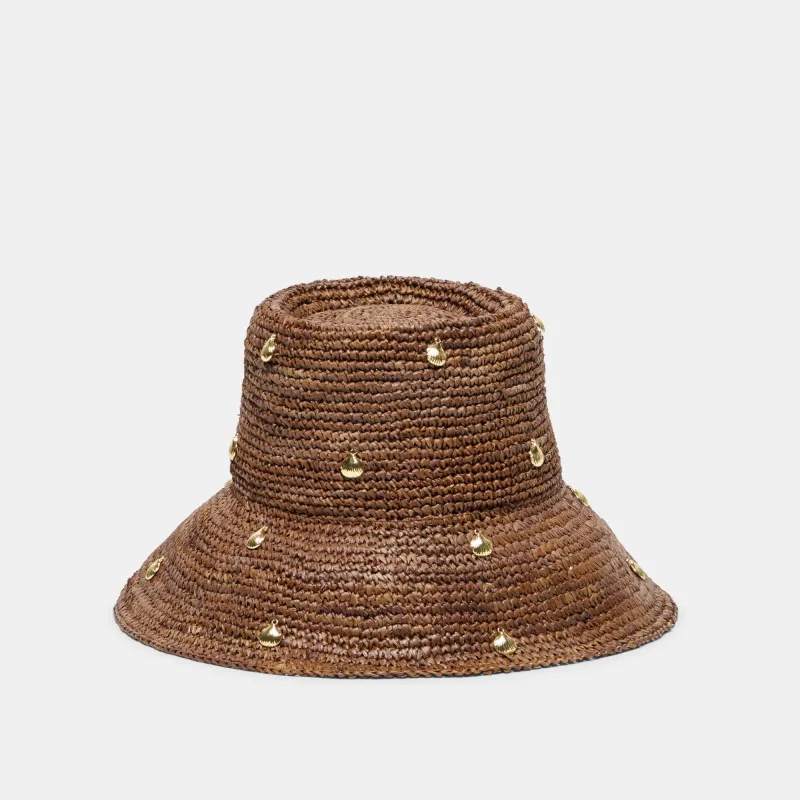 STRAW CLOCHE WITH CHARMS BROWN sold by Dolce Vita