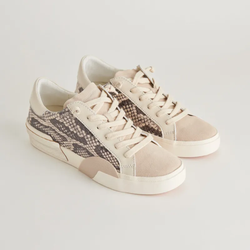 ZINA SNEAKERS BLACK WHITE EMBOSSED SNAKE sold by Dolce Vita