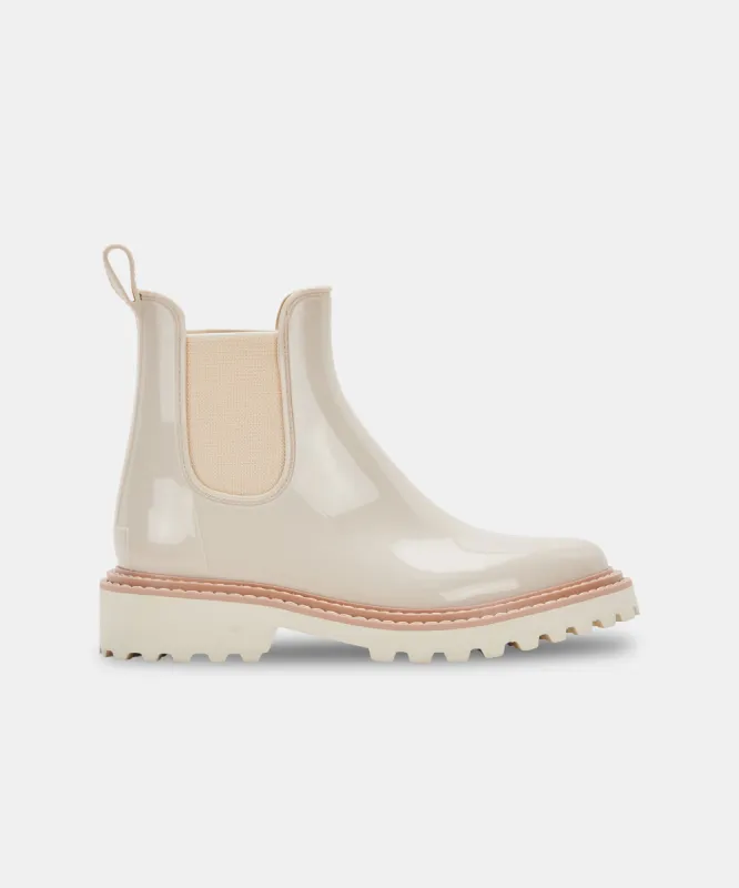 STORMY RAINBOOTS IVORY PATENT STELLA sold by Dolce Vita