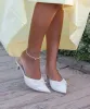 KAIRI MID HEELS IVORY CRINKLE PATENT sold by Dolce Vita
