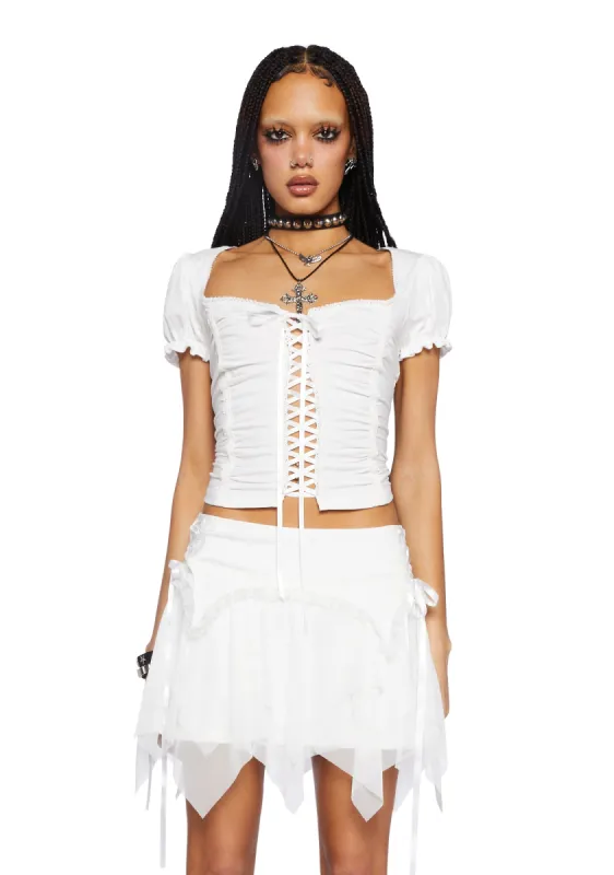 Soft Girl Era Lace Up Top- White sold by Dolls Kill