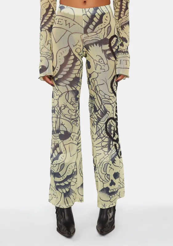 Eagle Skull Mesh Flare Pants sold by Dolls Kill