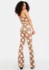 Tan Floral Fit And Flare Pants sold by Dolls Kill