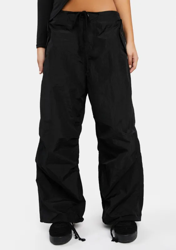 Black Rian Nylon Cargo Pants sold by Dolls Kill