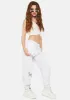 Metallic Butterfly Joggers sold by Dolls Kill