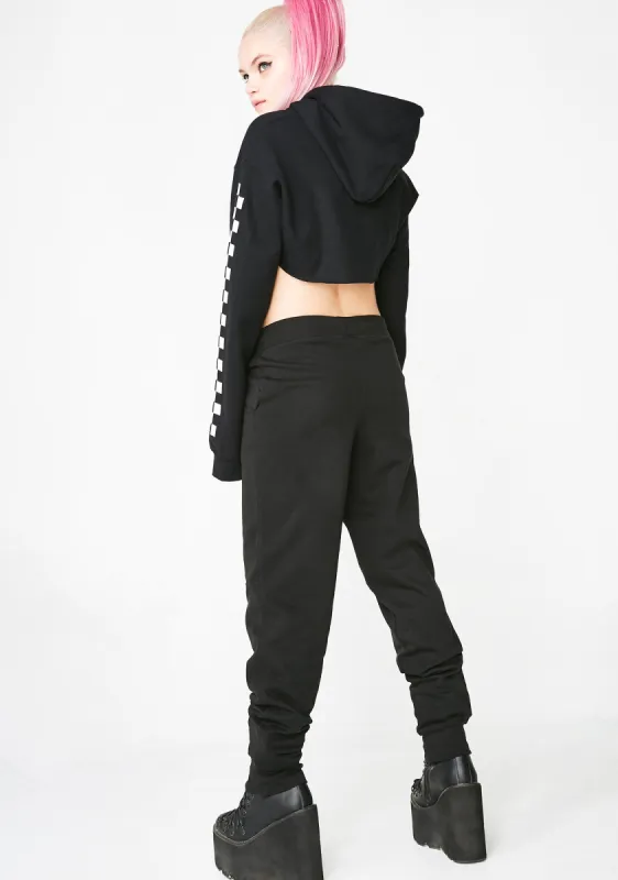 Checkerboard Joggers sold by Dolls Kill